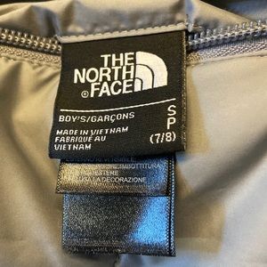 North face size small boys jacket black/ grey
